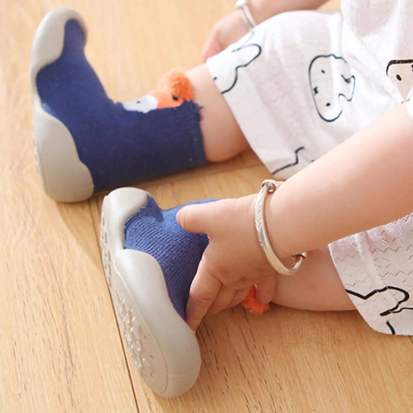 chaussure-bebe-de-marche-a-motifs-d_animaux-bleu-bebe-details